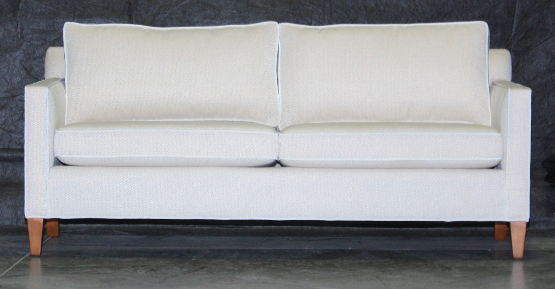 A Douglas condo sofa in white